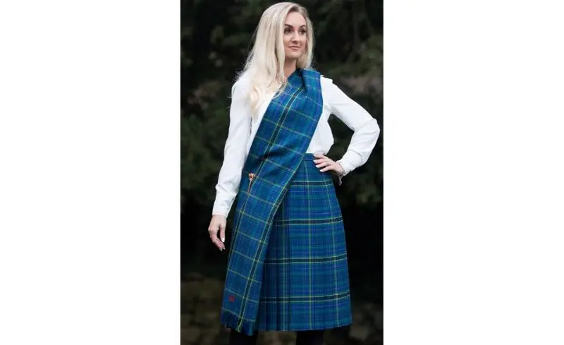 women wearing a tartan sash