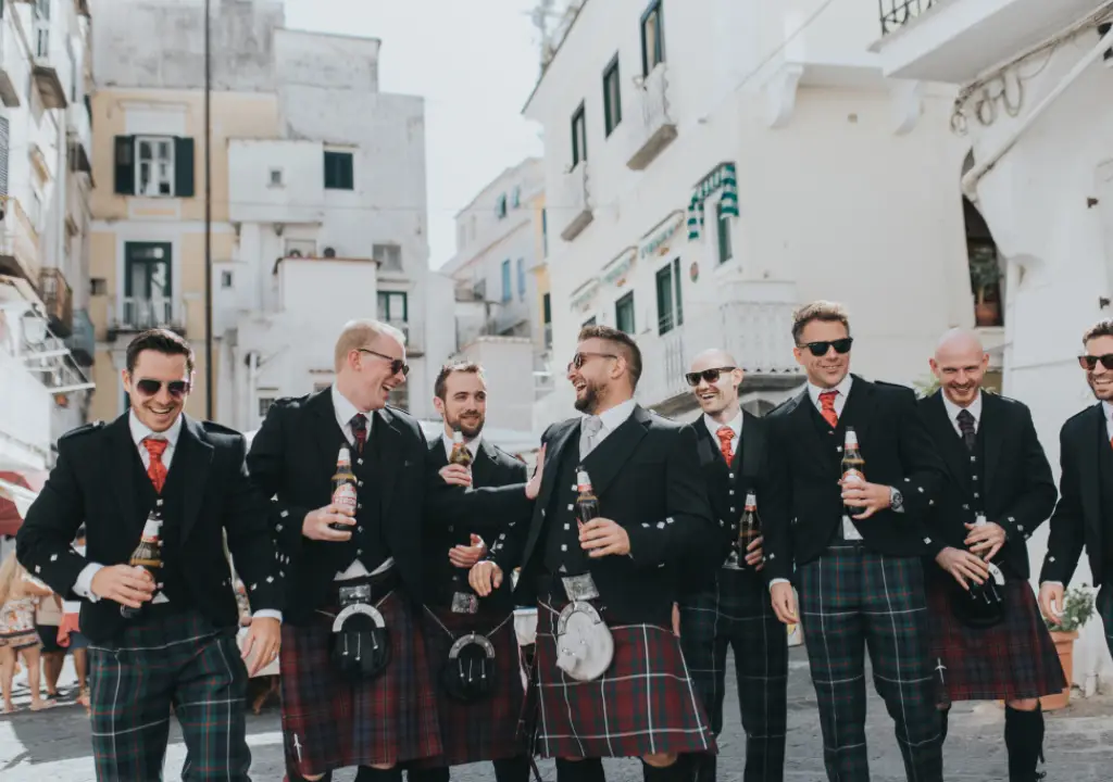 men wearing a kilts